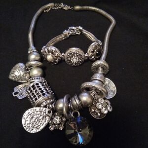 Silvertone charm necklace & bracelet
